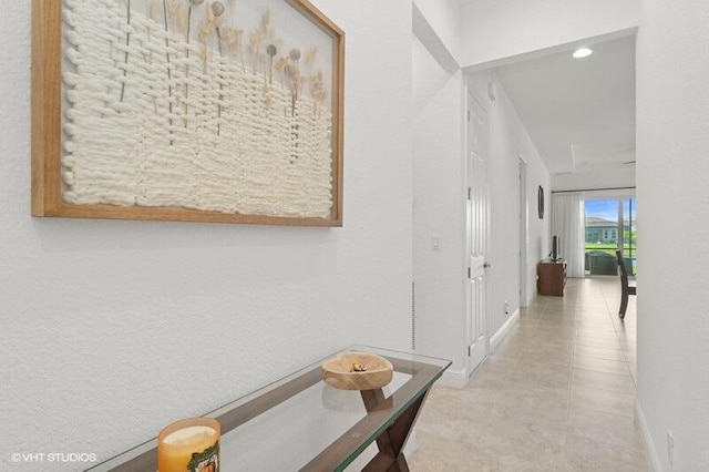 9155 SW Michele Way, Port Saint Lucie, FL 34987 - hall with baseboards and tile patterned flooring