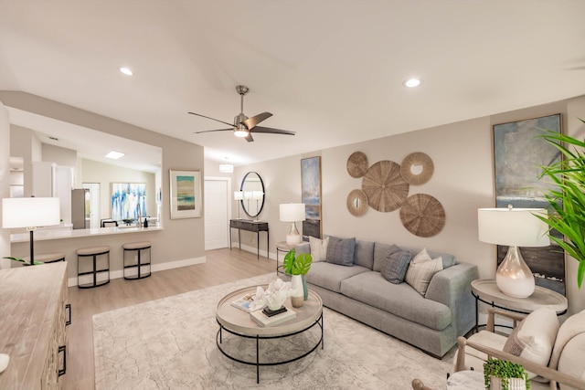 8008 Red Reef Ln, Boynton Beach, FL 33436 - living area featuring wood finished floors, ceiling fan, recessed lighting, and vaulted ceiling