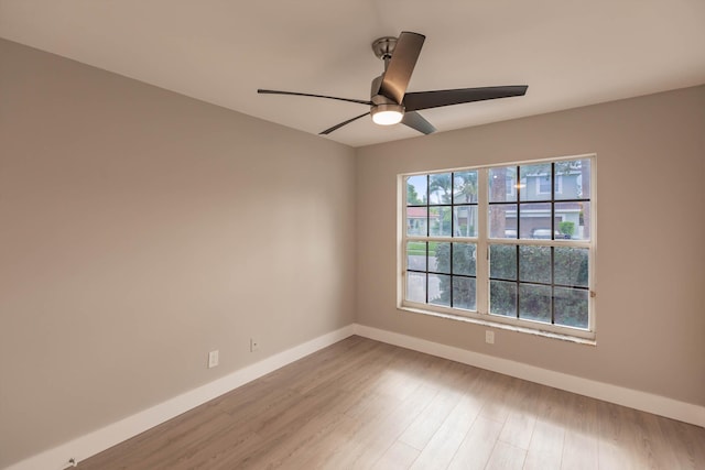 8008 Red Reef Ln, Boynton Beach, FL 33436 - spare room featuring a ceiling fan and wood finished floors
