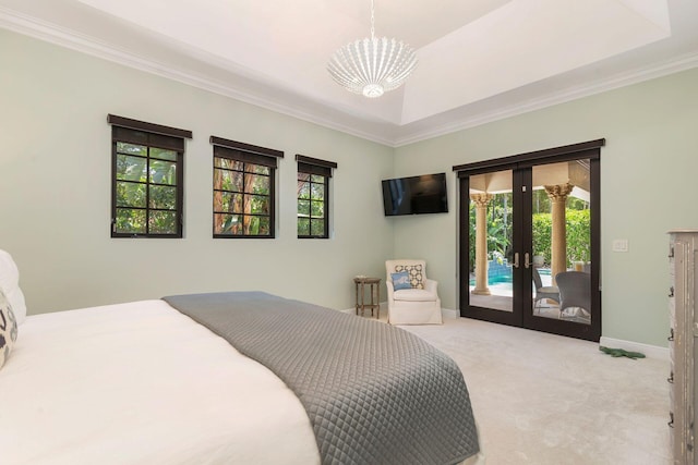 216 Summa St, West Palm Beach, FL 33405 - carpeted bedroom with french doors, access to exterior, a chandelier, and ornamental molding