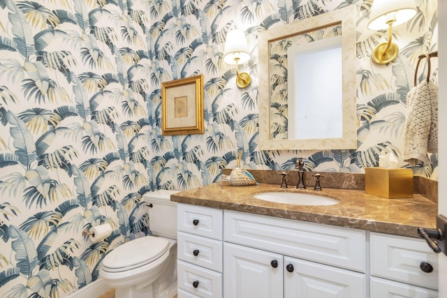 216 Summa St, West Palm Beach, FL 33405 - half bathroom with wallpapered walls and vanity