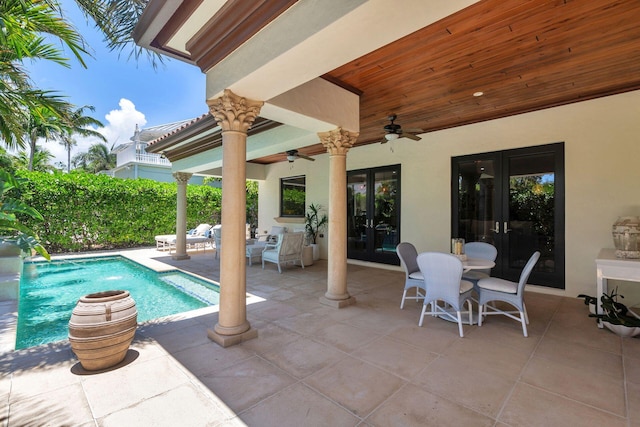216 Summa St, West Palm Beach, FL 33405 - outdoor pool featuring french doors, a ceiling fan, and a patio