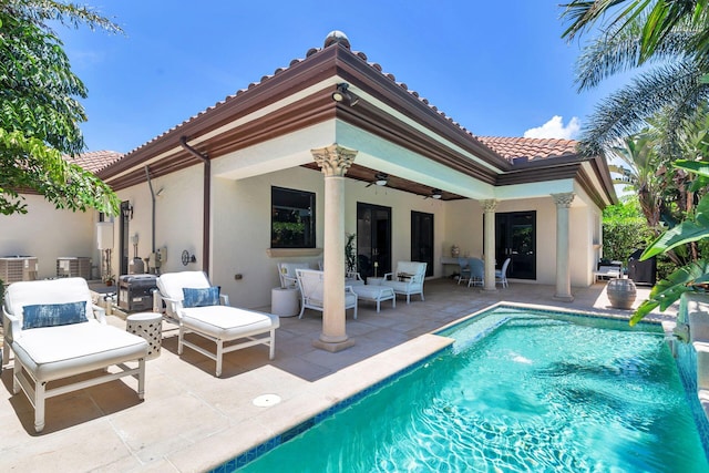 216 Summa St, West Palm Beach, FL 33405 - outdoor pool featuring ceiling fan and a patio area