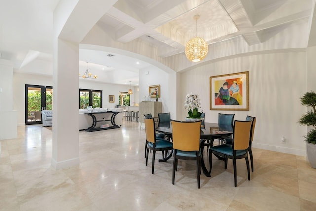 216 Summa St, West Palm Beach, FL 33405 - dining space with a chandelier, coffered ceiling, arched walkways, and beamed ceiling