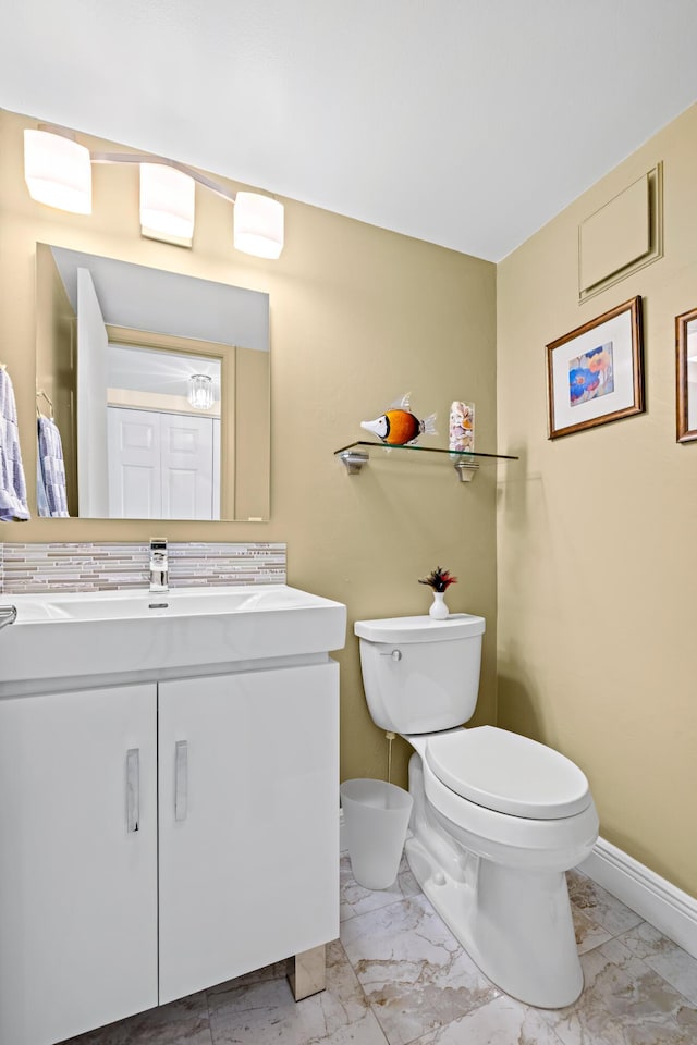 310 Farnham M Unit 310, Deerfield Beach, FL 33442 - half bathroom with marble look tiles and vanity