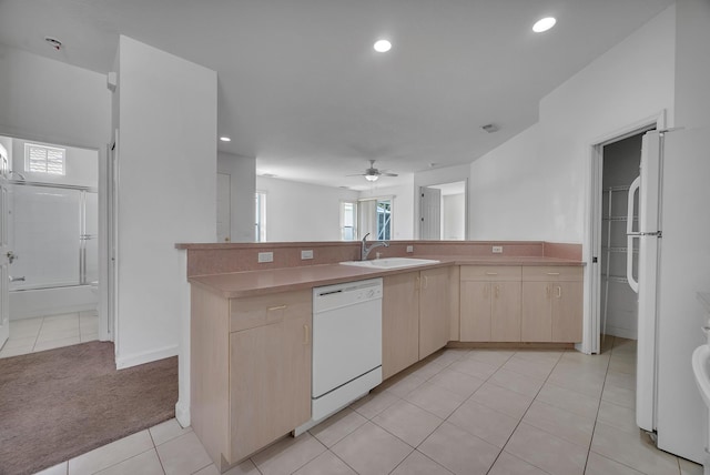 511 SW Treasure Cv, Port Saint Lucie, FL 34986 - kitchen with white appliances, light brown cabinets, a ceiling fan, light tile patterned flooring, and recessed lighting