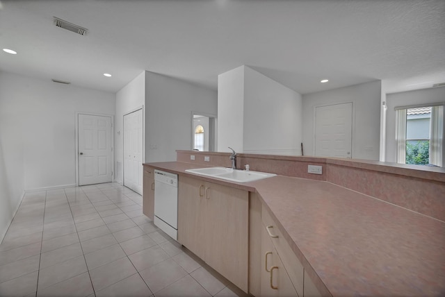 511 SW Treasure Cv, Port Saint Lucie, FL 34986 - kitchen featuring dishwasher, light tile patterned floors, recessed lighting, and light brown cabinetry