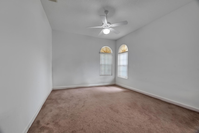 511 SW Treasure Cv, Port Saint Lucie, FL 34986 - unfurnished room featuring carpet and a ceiling fan
