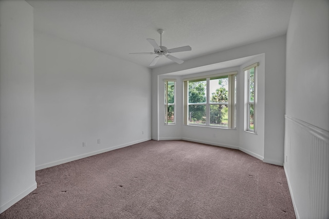 511 SW Treasure Cv, Port Saint Lucie, FL 34986 - carpeted spare room with ceiling fan and baseboards