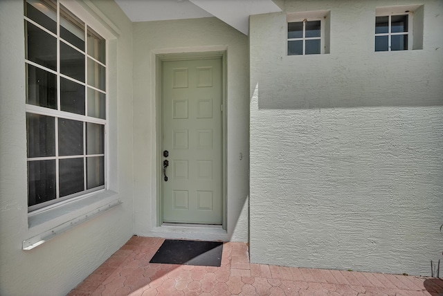 511 SW Treasure Cv, Port Saint Lucie, FL 34986 - entrance to property with stucco siding