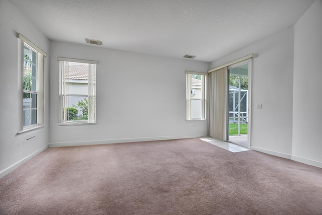 511 SW Treasure Cv, Port Saint Lucie, FL 34986 - unfurnished room featuring carpet and baseboards