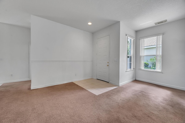 511 SW Treasure Cv, Port Saint Lucie, FL 34986 - carpeted empty room featuring baseboards and recessed lighting