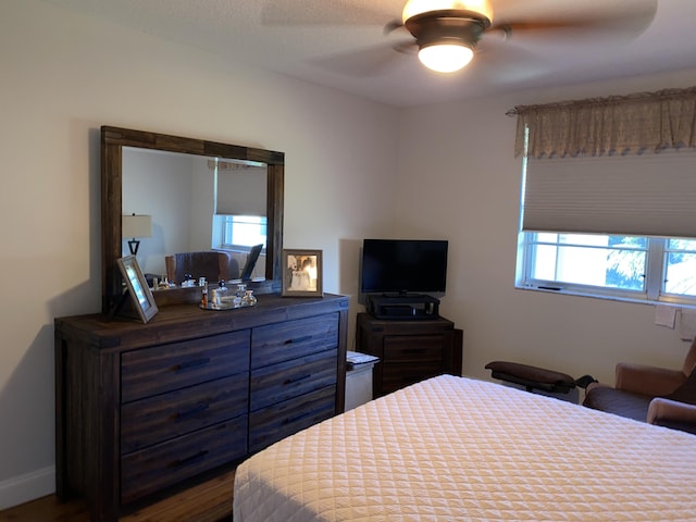 2975 SW 22nd Ave Unit 2010, Delray Beach, FL 33445 - bedroom with ceiling fan and wood finished floors