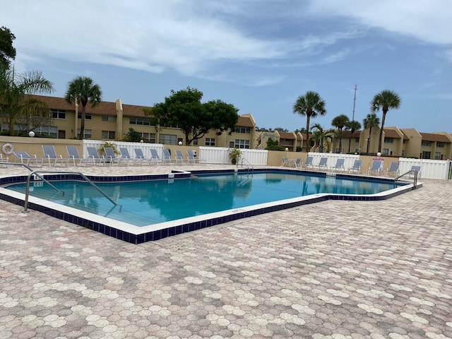 2975 SW 22nd Ave Unit 2010, Delray Beach, FL 33445 - community pool with a patio and a residential view