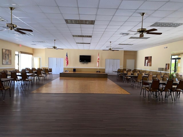 2975 SW 22nd Ave Unit 2010, Delray Beach, FL 33445 - dining room featuring a ceiling fan, wood finished floors, and a drop ceiling