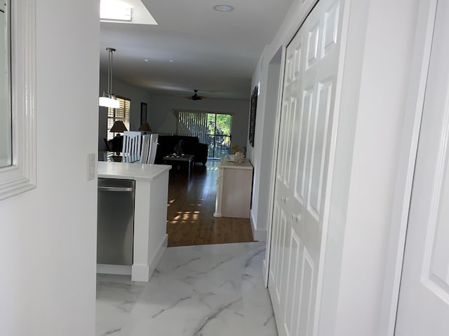 2975 SW 22nd Ave Unit 2010, Delray Beach, FL 33445 - hall featuring dark marble finish flooring and baseboards