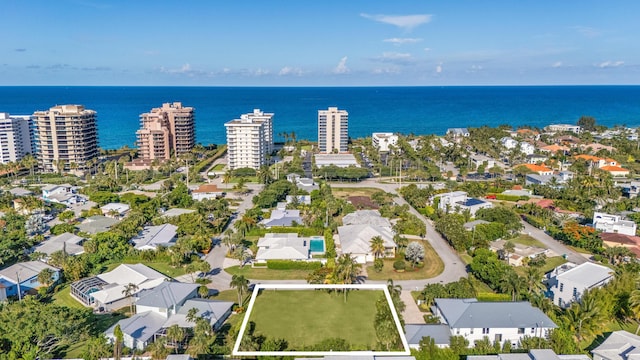 461 Apollo Dr, Juno Beach, FL 33408 - aerial overview of property's location with a large body of water and nearby suburban area