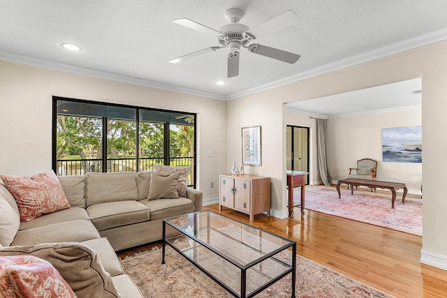 45 Stratford Ln Unit B, Boynton Beach, FL 33436 - living area with light wood-style flooring, ceiling fan, crown molding, and recessed lighting
