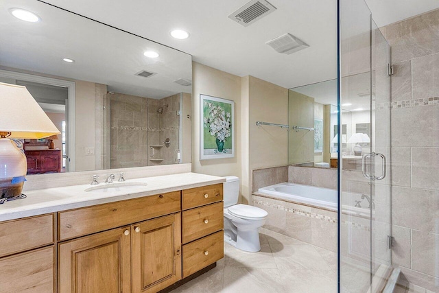 45 Stratford Ln Unit B, Boynton Beach, FL 33436 - bathroom featuring a bath, a stall shower, vanity, and recessed lighting