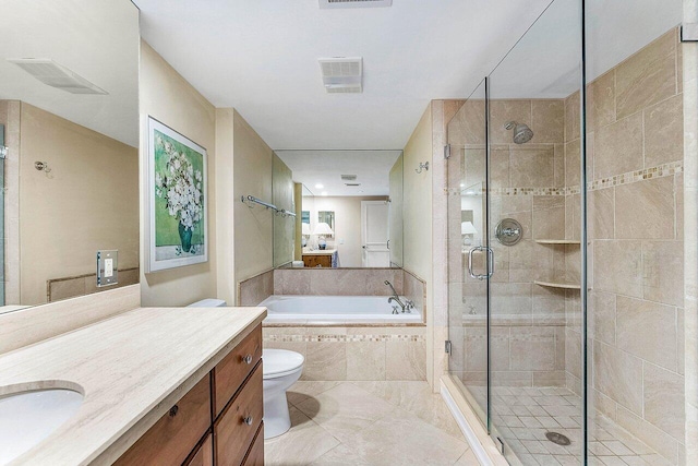 45 Stratford Ln Unit B, Boynton Beach, FL 33436 - full bathroom featuring a bath, vanity, a shower stall, and tile patterned floors