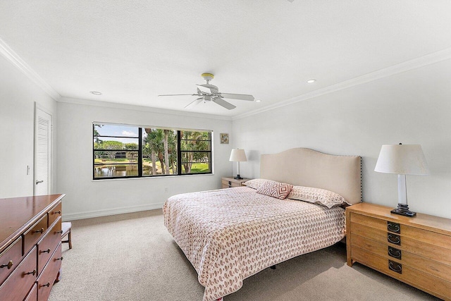 45 Stratford Ln Unit B, Boynton Beach, FL 33436 - bedroom with light colored carpet, ornamental molding, recessed lighting, and a ceiling fan