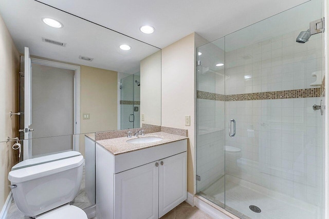 45 Stratford Ln Unit B, Boynton Beach, FL 33436 - full bathroom featuring a stall shower, vanity, and recessed lighting