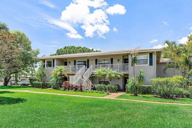45 Stratford Ln Unit B, Boynton Beach, FL 33436 - view of building exterior featuring stairs