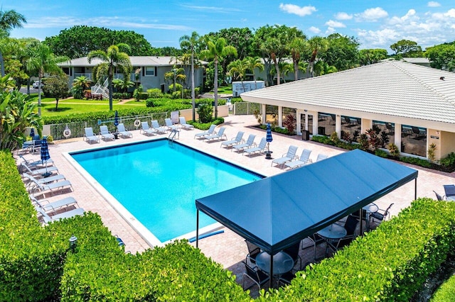 45 Stratford Ln Unit B, Boynton Beach, FL 33436 - community pool with a patio area