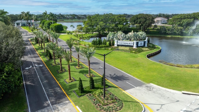 45 Stratford Ln Unit B, Boynton Beach, FL 33436 - view of property's community with a water view, a lawn, and view of wooded area