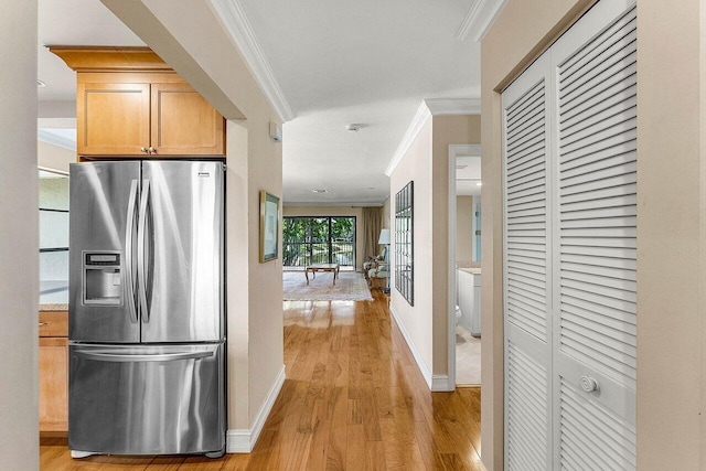45 Stratford Ln Unit B, Boynton Beach, FL 33436 - hall with crown molding, light wood-style floors, and french doors