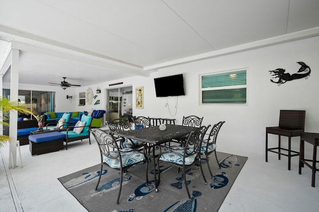 4931 SE Pompano Ter, Stuart, FL 34997 - dining space with ceiling fan and beam ceiling
