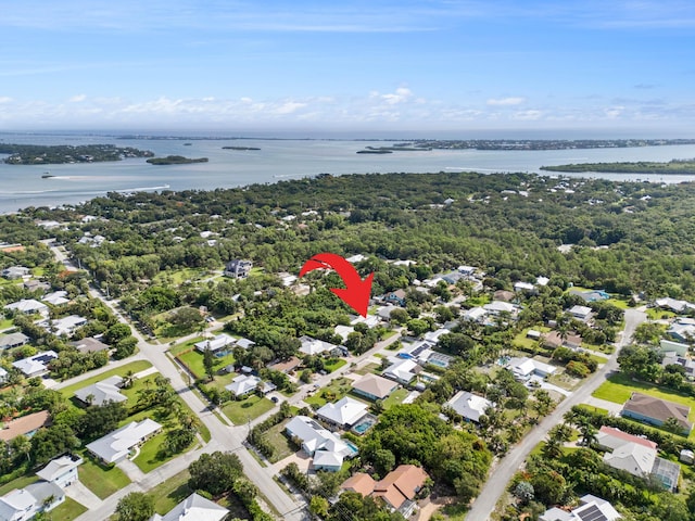 4931 SE Pompano Ter, Stuart, FL 34997 - aerial view of property and surrounding area with a large body of water and nearby suburban area