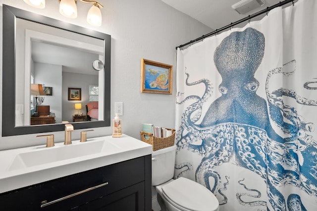 4931 SE Pompano Ter, Stuart, FL 34997 - bathroom featuring ensuite bathroom, vanity, and curtained shower
