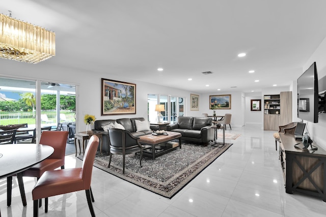 7197 Encina Ln, Boca Raton, FL 33433 - living area featuring recessed lighting, a chandelier, and light tile patterned floors