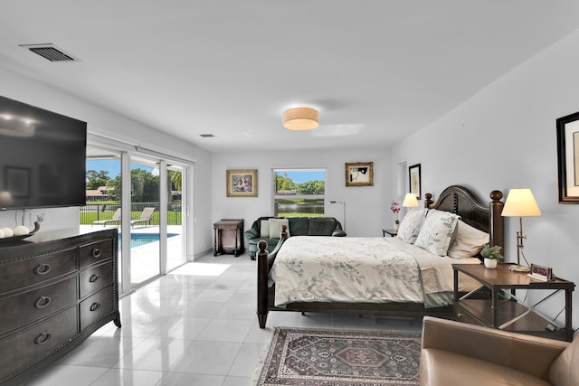 7197 Encina Ln, Boca Raton, FL 33433 - bedroom featuring access to exterior and multiple windows