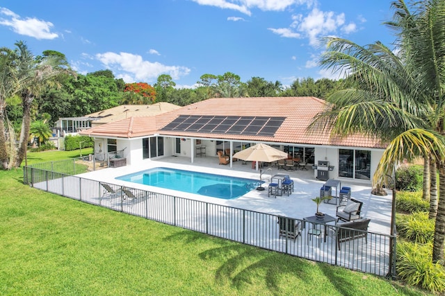 7197 Encina Ln, Boca Raton, FL 33433 - view of pool with outdoor dining space, a patio, a fenced backyard, area for grilling, and an outdoor hangout area