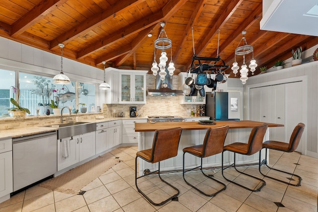 1400 Parkland Blvd, Fort Pierce, FL 34982 - kitchen featuring wood ceiling, stainless steel appliances, butcher block countertops, backsplash, and light tile patterned flooring