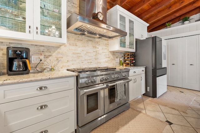 1400 Parkland Blvd, Fort Pierce, FL 34982 - kitchen with appliances with stainless steel finishes, wall chimney exhaust hood, wooden ceiling, backsplash, and light tile patterned floors