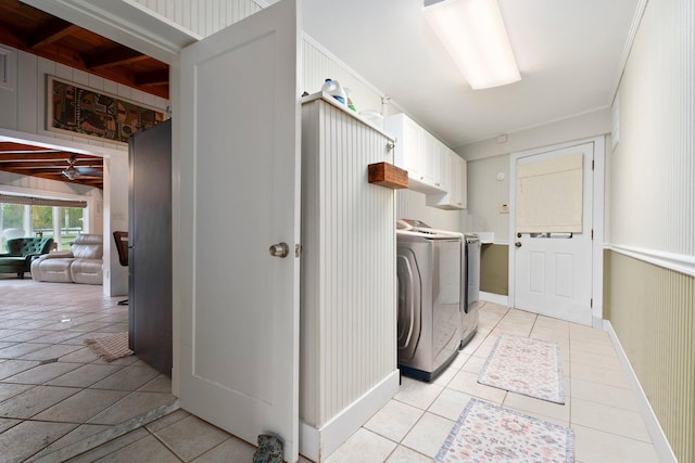 1400 Parkland Blvd, Fort Pierce, FL 34982 - laundry room with washer / clothes dryer, cabinet space, and light tile patterned floors