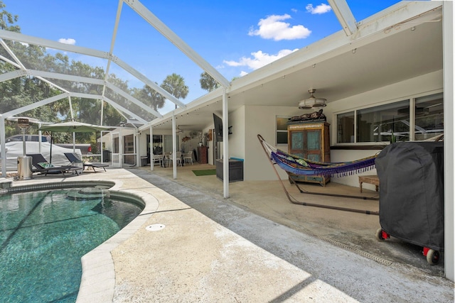 1400 Parkland Blvd, Fort Pierce, FL 34982 - outdoor pool with a patio, ceiling fan, grilling area, and glass enclosure