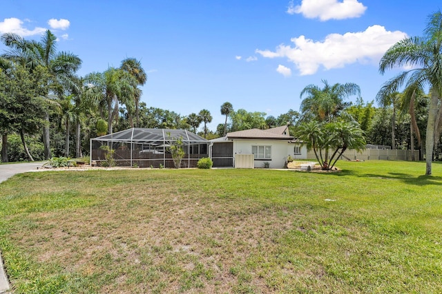 1400 Parkland Blvd, Fort Pierce, FL 34982 - view of yard featuring a lanai