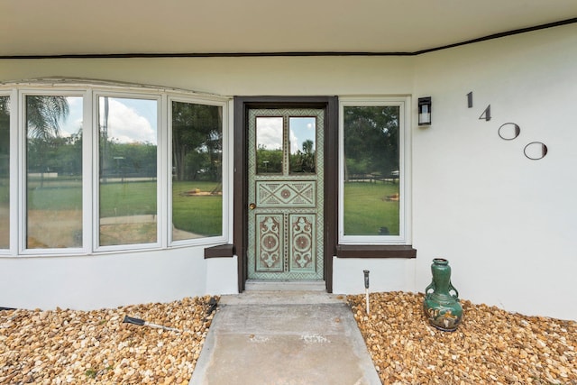 1400 Parkland Blvd, Fort Pierce, FL 34982 - doorway to property featuring stucco siding
