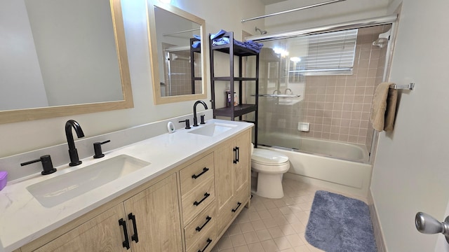 6140 Stanley Ln, Delray Beach, FL 33484 - full bath featuring double vanity, tile patterned flooring, and shower / bath combination with glass door