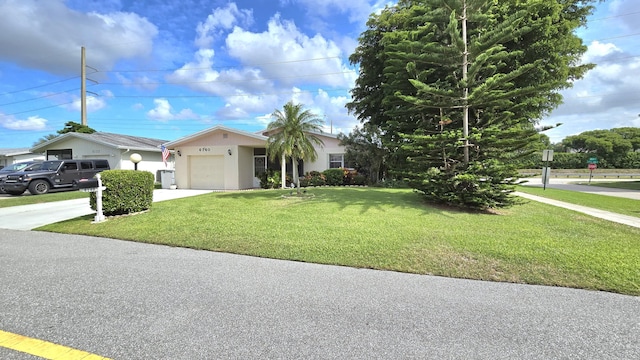 6140 Stanley Ln, Delray Beach, FL 33484 - ranch-style house featuring an attached garage, concrete driveway, a front yard, and stucco siding