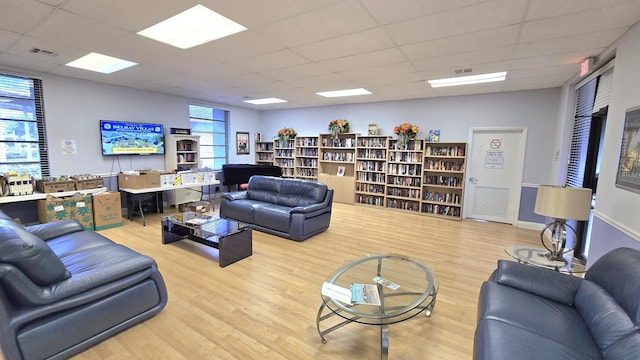 6140 Stanley Ln, Delray Beach, FL 33484 - living area with a drop ceiling and wood finished floors