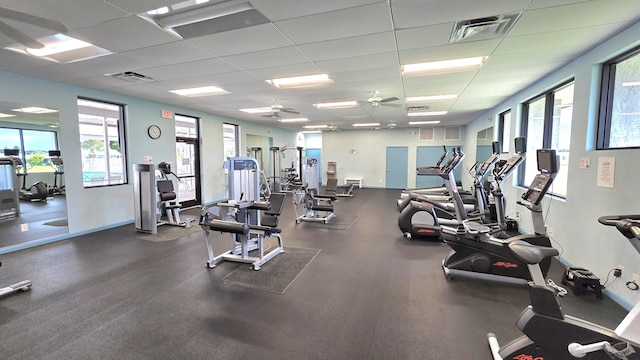 6140 Stanley Ln, Delray Beach, FL 33484 - workout area featuring plenty of natural light, a paneled ceiling, and ceiling fan