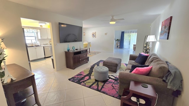6140 Stanley Ln, Delray Beach, FL 33484 - living area featuring light tile patterned flooring and ceiling fan