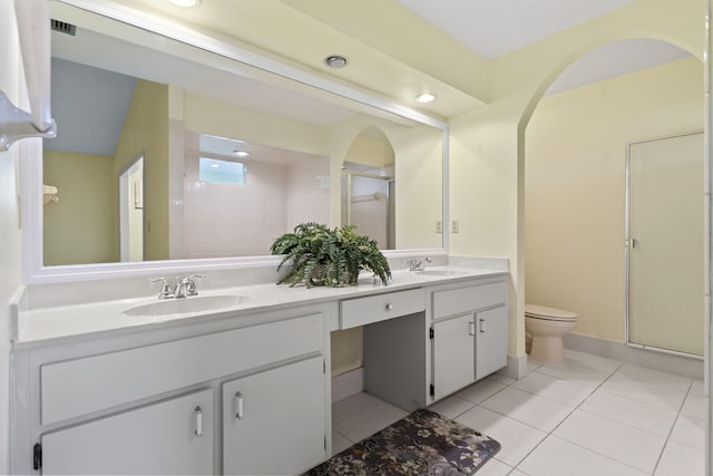 5623 SE Foxcross Pl, Stuart, FL 34997 - bathroom with double vanity, a shower stall, tile patterned flooring, and recessed lighting