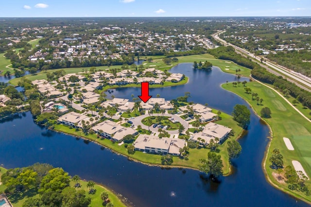 5623 SE Foxcross Pl, Stuart, FL 34997 - aerial view of property and surrounding area featuring nearby suburban area, a nearby body of water, and a golf course