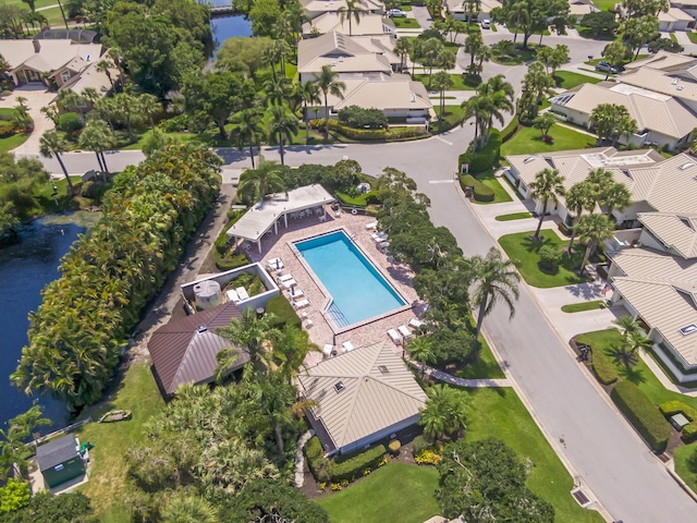 5623 SE Foxcross Pl, Stuart, FL 34997 - aerial view of residential area featuring a pool and a large body of water